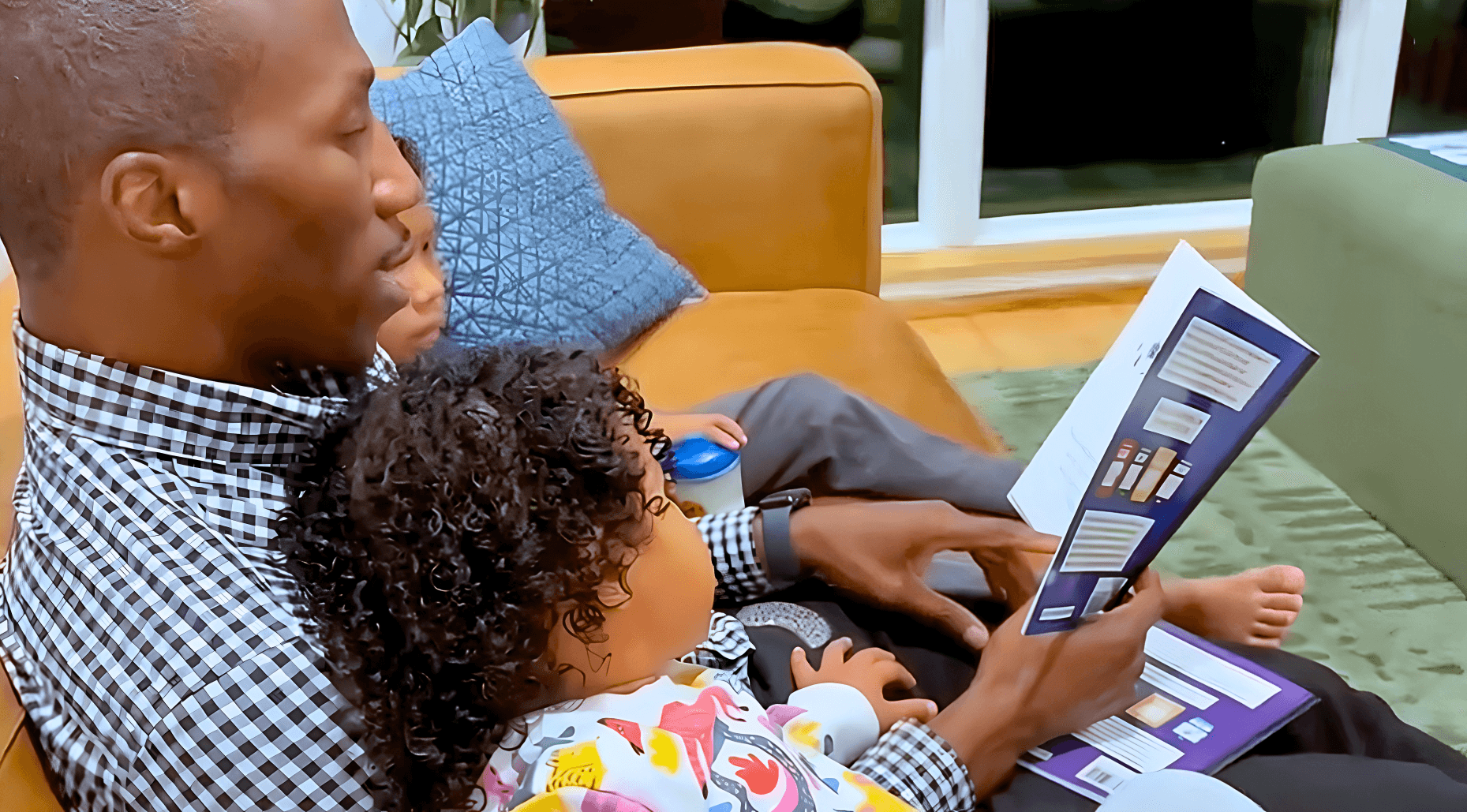 Man Reading to Kids