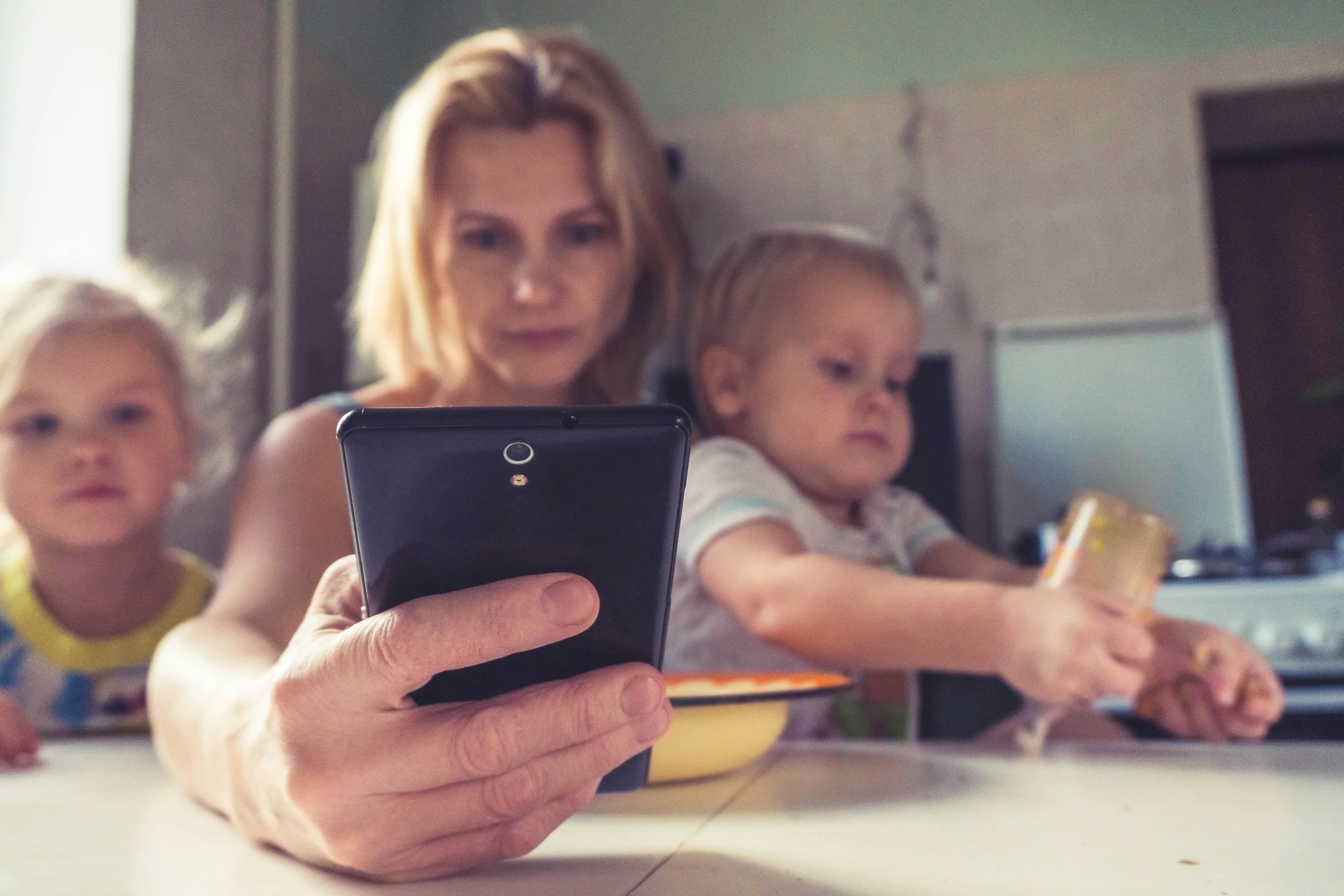 mom staring at phone